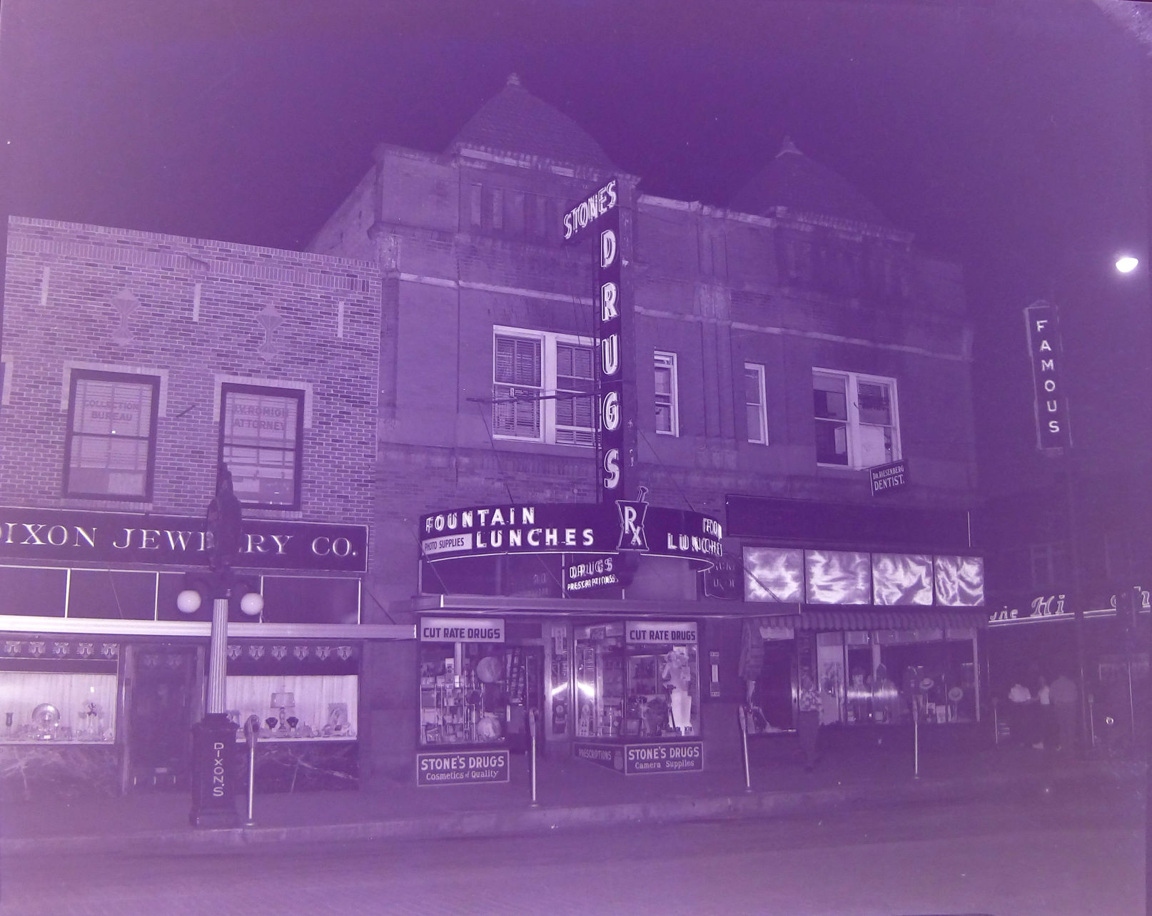 Stone's Drugs and The Famous, Dickey Building, 520-22 N Dewey, ca. 1940s (Heritage Images).JPG